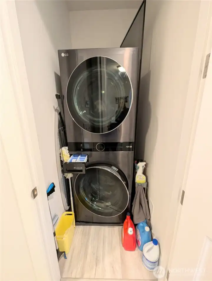 convenient stacked LG washer and dryer on second floor