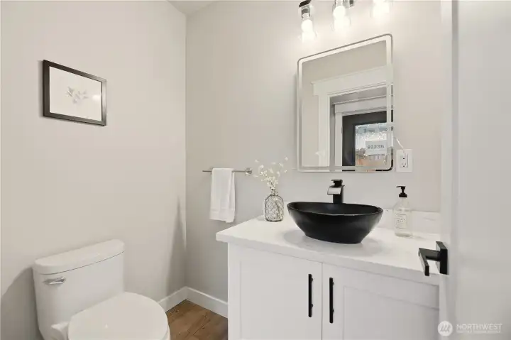 This half bath is conveniently located on the main floor and is great for when guests come to visit.