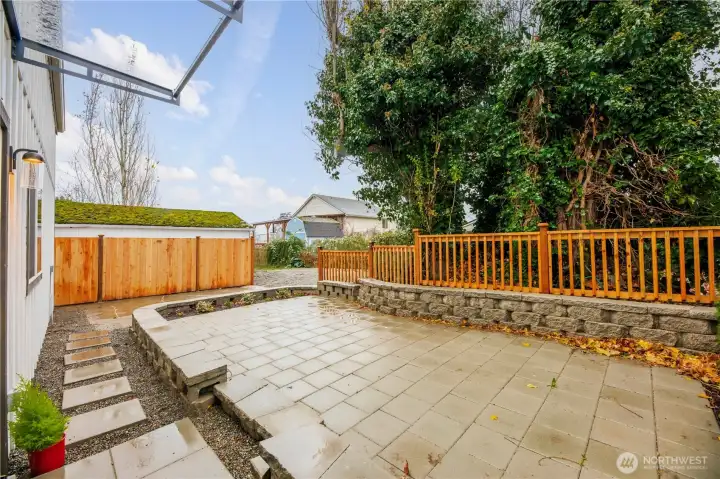 Large patio is great for adding additional exterior living space. You can put a barbeque and table and chairs out here and enjoy this area during the warmer seasons.