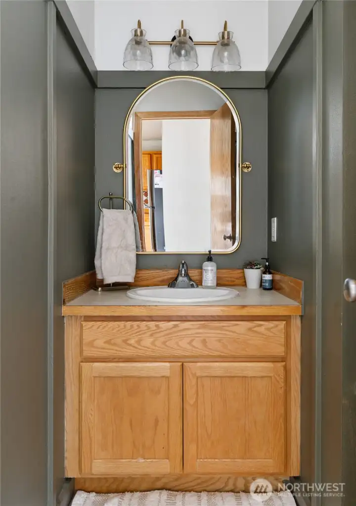 Newly updated half bath on main level.