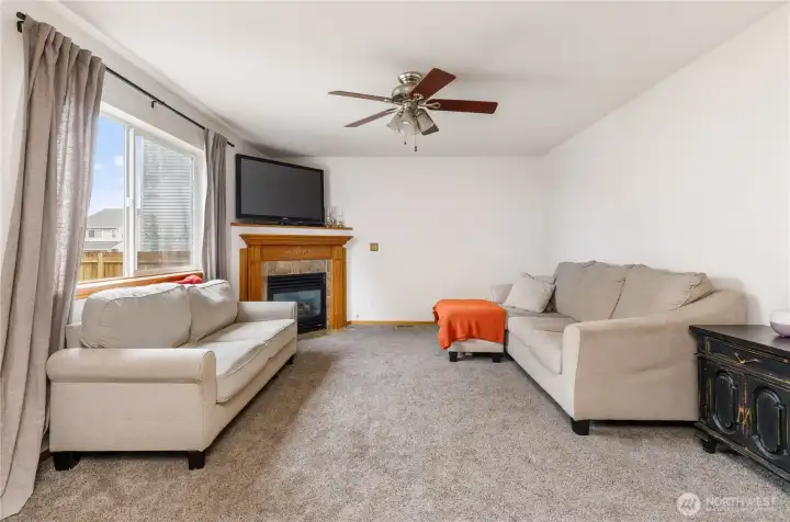 Flowing directly from dining area, we enter the family room. A gas fireplace adds just the right touch on chilly Whidbey nights.