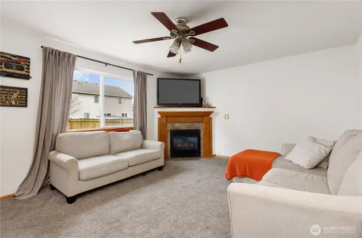 Large area, overhead fan for comfort, and oversized window add lots of natural light!