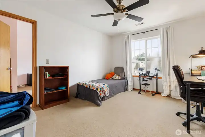 A big bonus room offers so many options! Extra sleeping area for guests, TV room, game room... You decide! Complete with large overhead fan for added comfort.