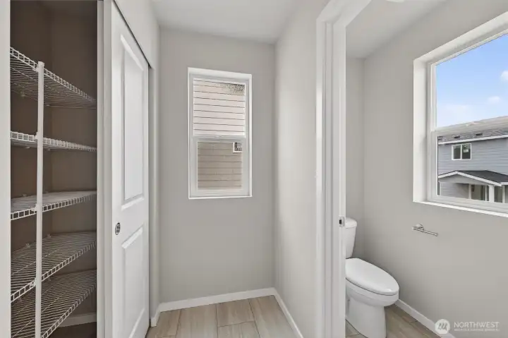 One of 3 linen closets