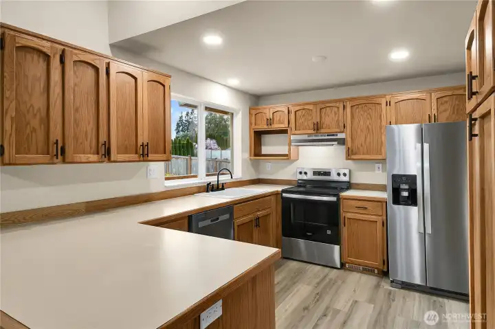 Kitchen with eating area- stainless steel appliances all stay!