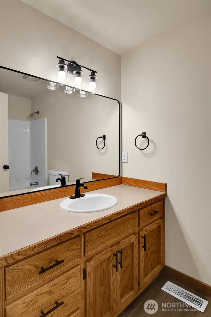 Full hall bathroom with tub