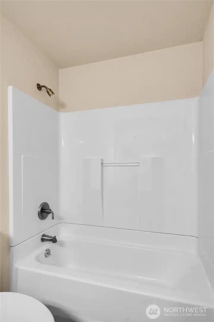 Full hall bathroom with tub