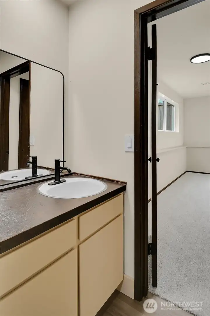 Three quarter bathroom with shower downstairs