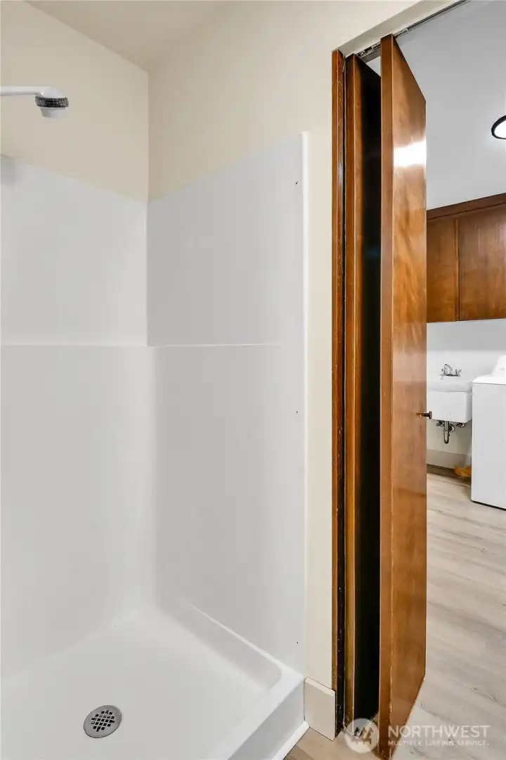 Three quarter bathroom with shower downstairs