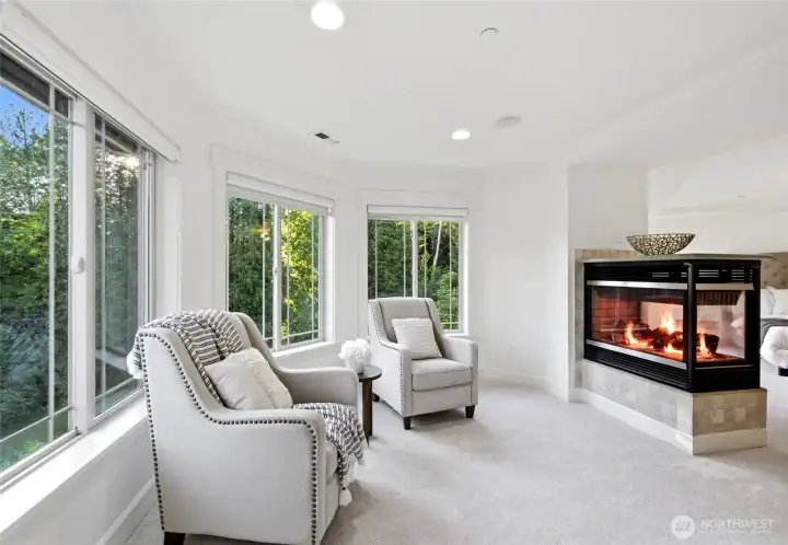 The Primary Suite relaxing sitting room, overlooking the grounds & sunsets