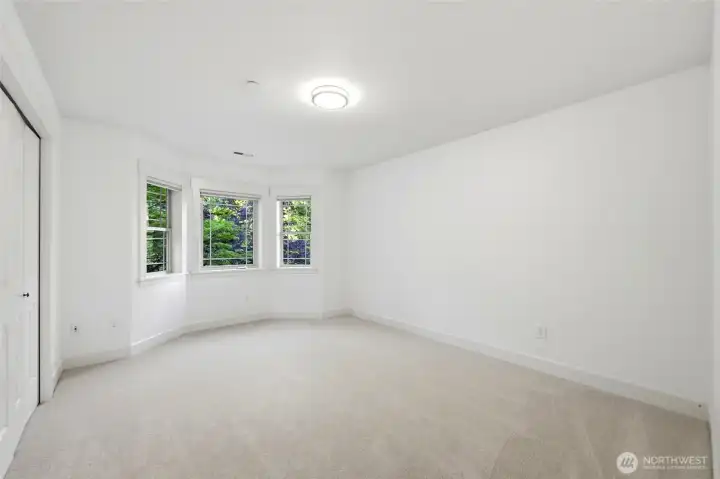 One of 7 bedrooms, en-suite full bath attached