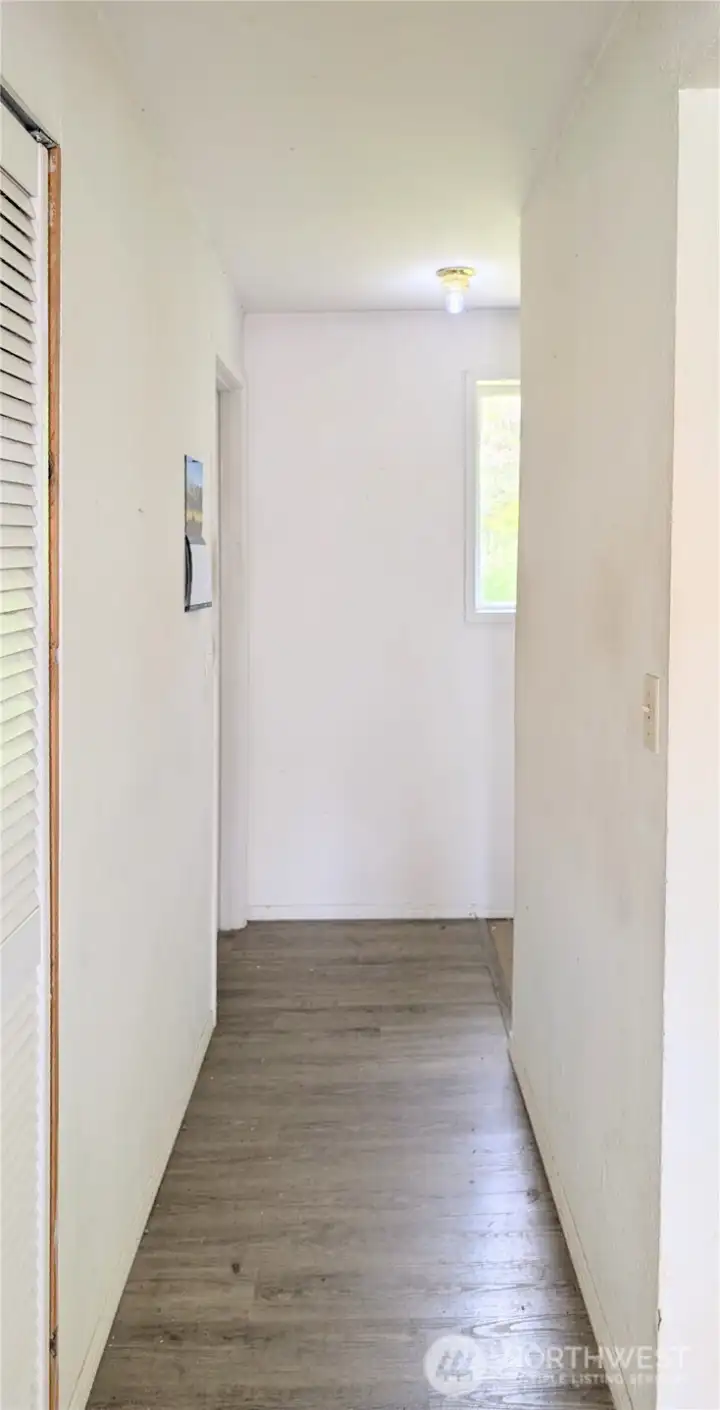 Hallway to bath and utility room