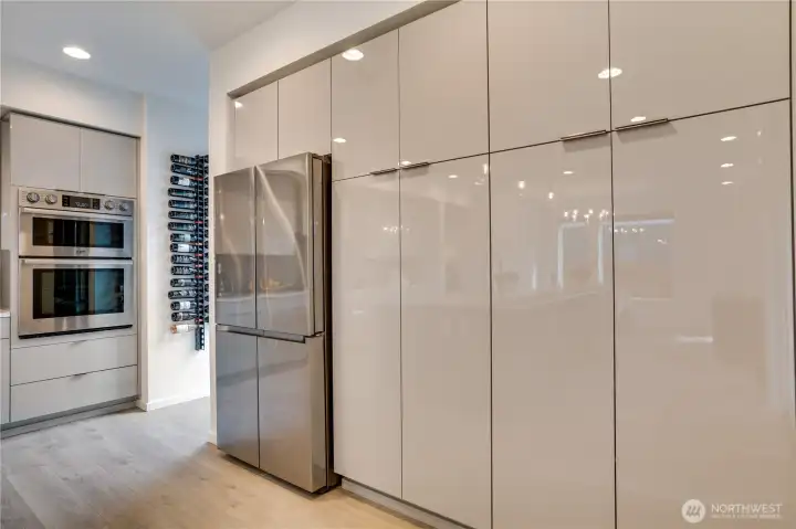 Elevated stainless appliances-Decor fridge, Dacor Combination Convection Microwave Upper & Convection Oven Lower, Kitchenaid cook-top, a Kitchenaid dishwasher so quiet you'll forget it exists-nothing here will disappoint.
