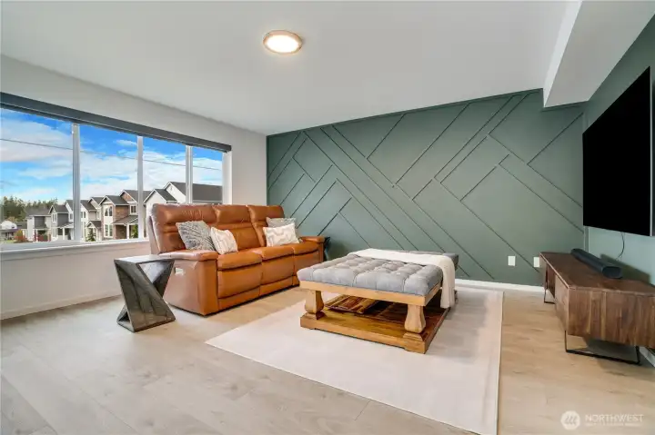 Upstairs hardwood flooring flows seamlessly throughout.