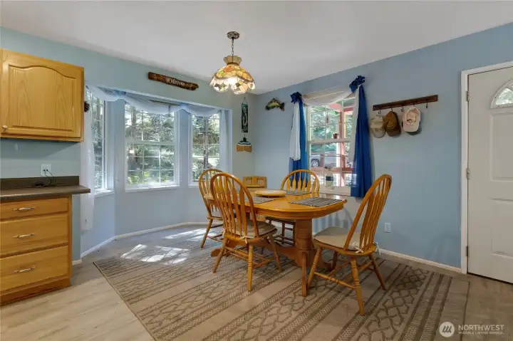 Nice sized nook for all your dining needs. Many windows bring in a plethora of light