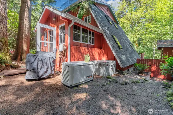 This home comes with a generator and a/c