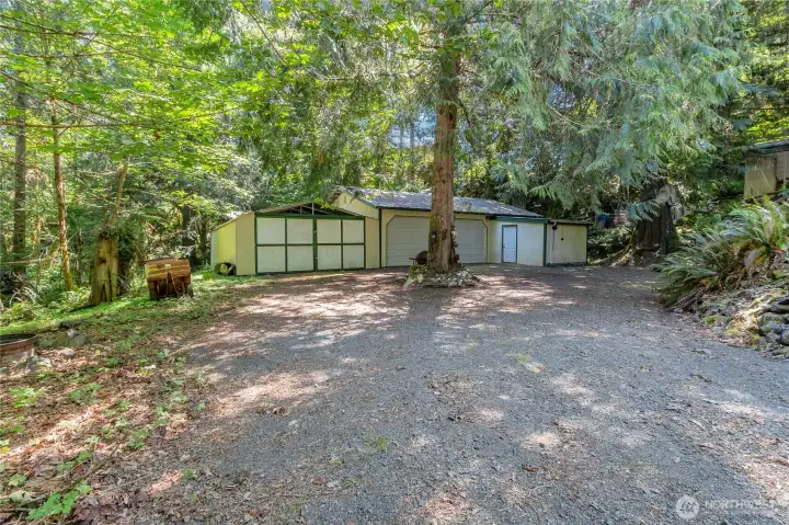 4 car garage parking + RV parking up above
