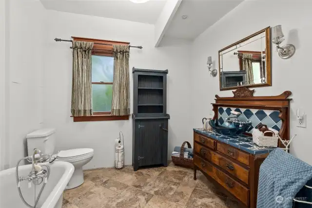 Bathroom with  claw tub.
