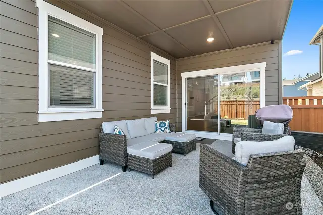 This inviting space provides protection from the elements while offering a seamless connection to your outdoor living area.