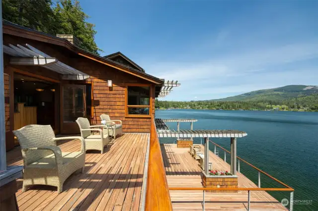 Looking down the purpleheart deck on the main floor with the expansive wraparound deck below.