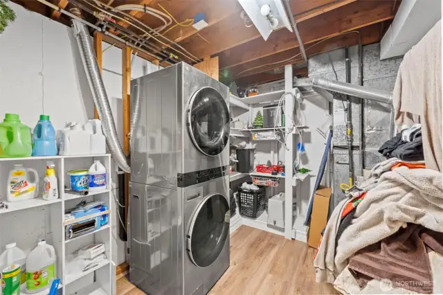 The utilty/mechanical room also has refreshed flooring and also has plenty of storage space.  This beautiful stackable washer and dry set remains with the home.