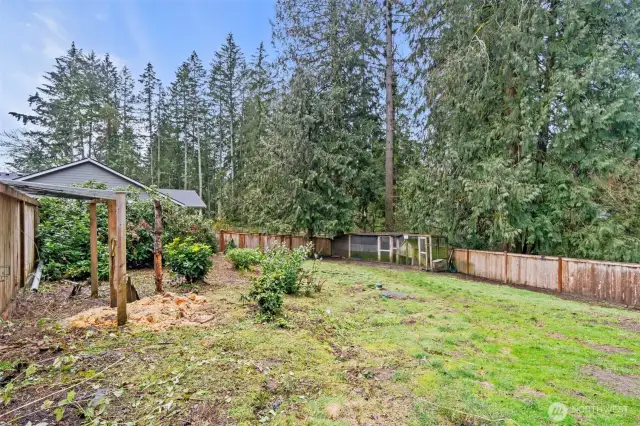 Another view of the fenced portion of the yards.  The home is nestled on 1.01 acres with an additional .87 acre parcel that is sold along with it.