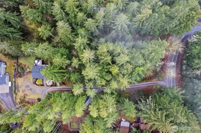 An aerial view of the home on 1.01 acres as well as the additional .87 acres that continues to Hunt St.