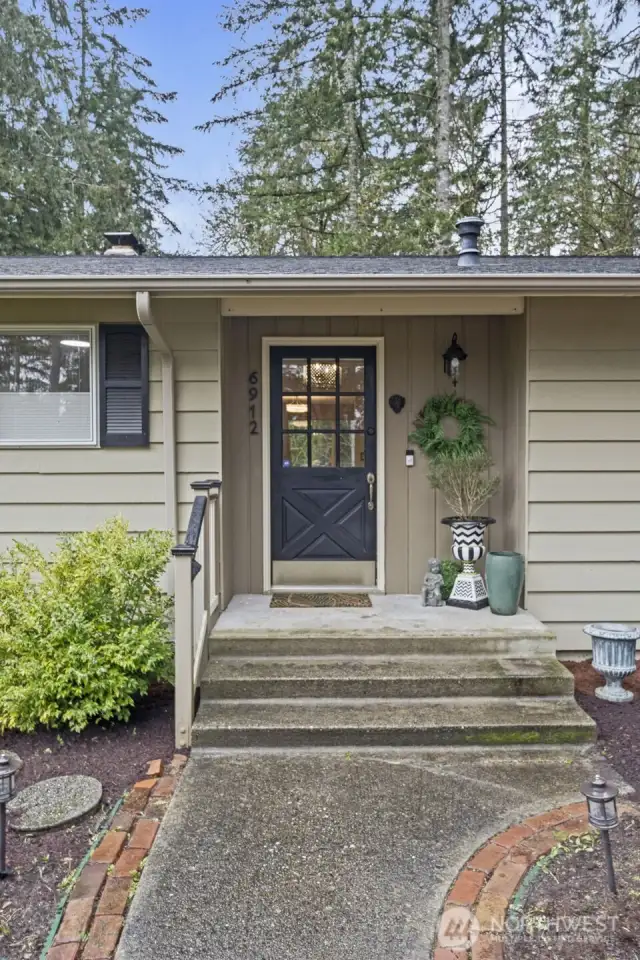 The welcoming front porch invites guests to step inside and stay awhile.