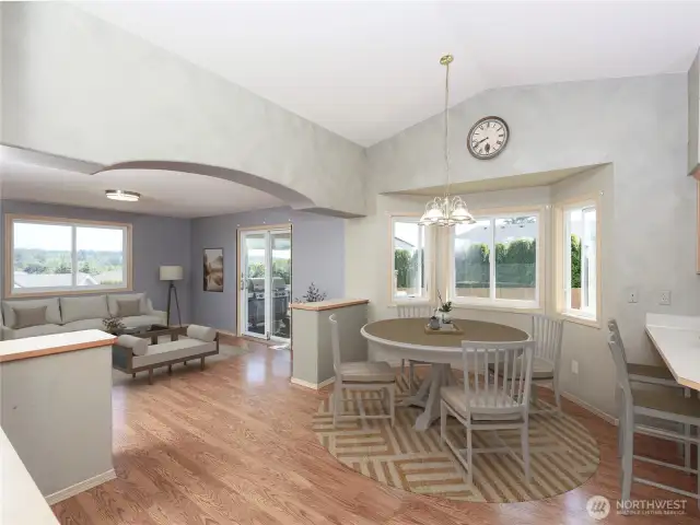 Vaulted ceilings and lots of windows. virtually staged