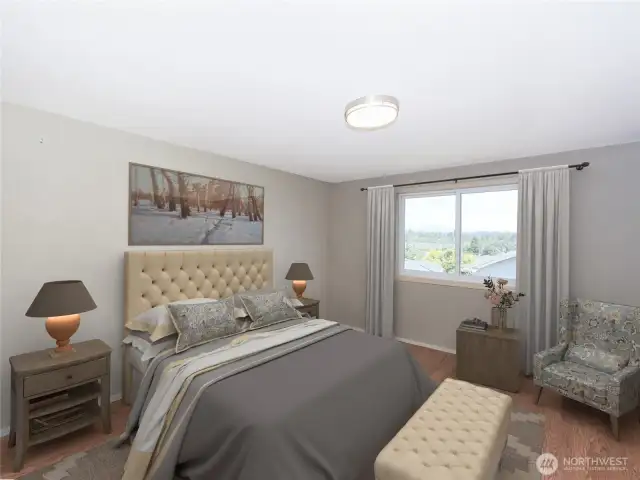 Primary bedroom features 2 closets as well as a 5 piece en suite. virtually staged