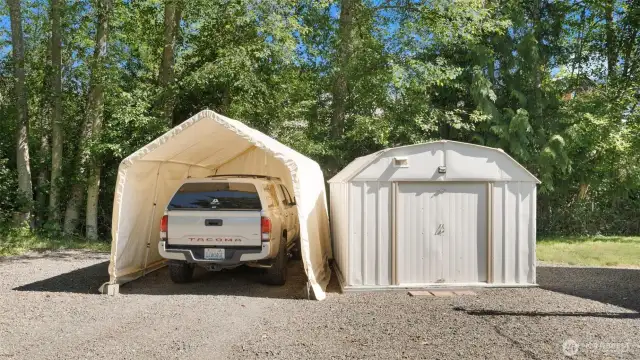 Yep, the carport and shed stay—because a little extra storage space always comes in handy!