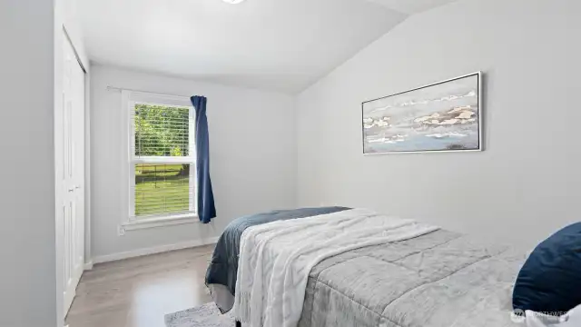 The first bedroom offers a peaceful green view that brings the outdoors in. Wake up to the soft natural light filtering through the windows - it’s a calming way to start and end each day.