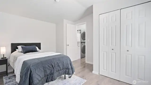 Currently used as the primary bedroom, this second bedroom offers comfort, space, and great natural light.