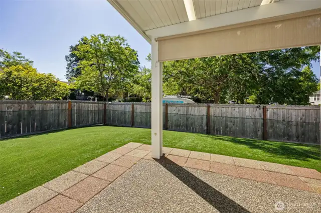 Back patio with pergola including sun/privacy shade.