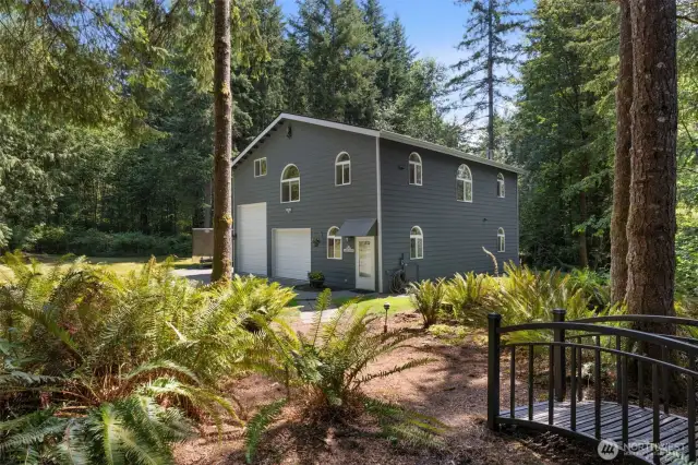 Guest home retreat—set back from the main house with aggregate driveways and room for all your toys