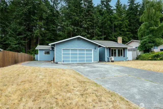 2107 Driftwood is a single level home home an established neighborhood up on the hill - close to everything. Ample parking with a two car garage and additional parking on the side.