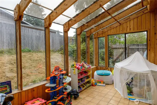 Sunroom is being used as a playroom