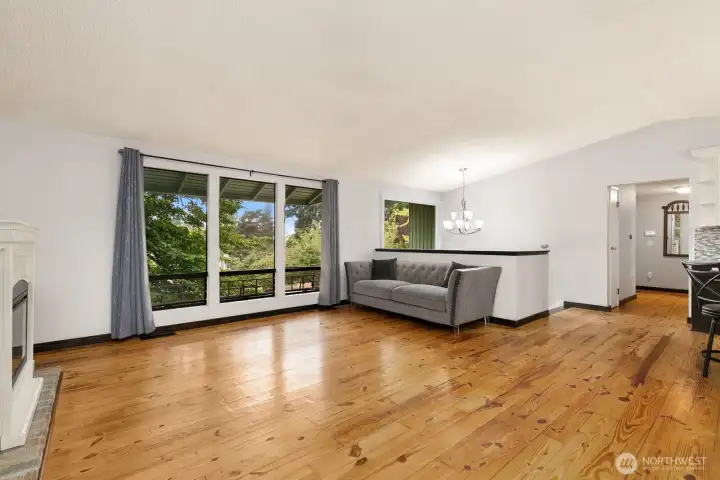 Large windows flood the room with natural light.