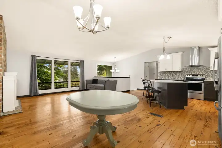 Large great room features vaulted ceilings