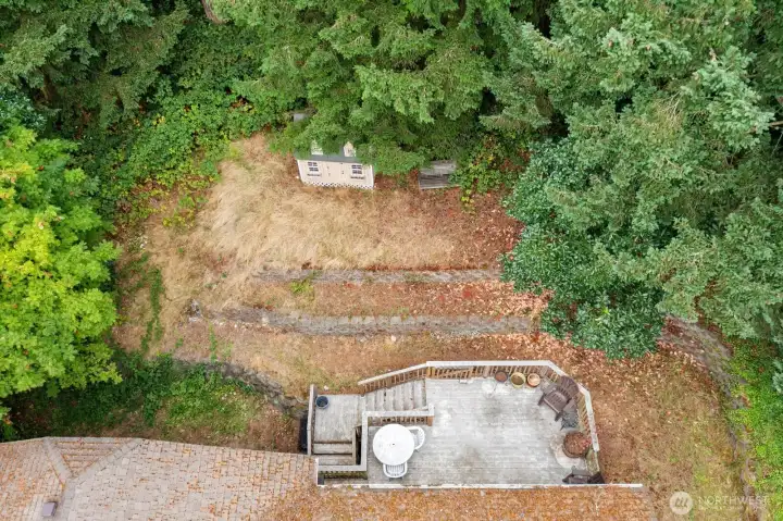Back yard is terraced and ready for all your ideas! Lots of space here!