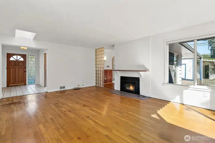 Entry looks straight into the main family room, real hardwood floors!