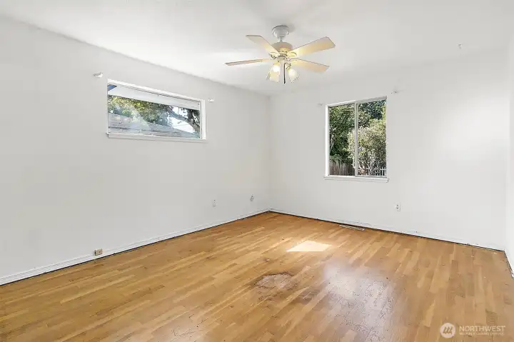 Bedroom 1, real hardwood floors, walk-in closet