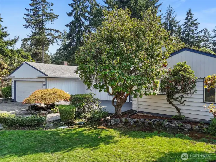 Beautiful front yard with mature landscape