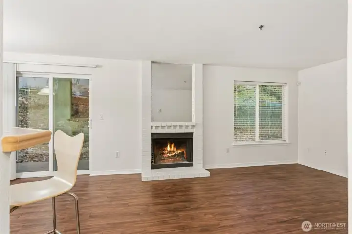 Open concept living and dining rooms with new flooring and paint throughout!