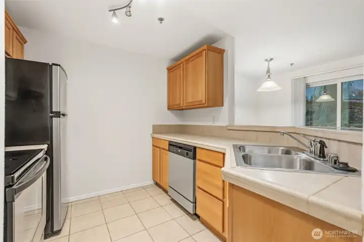 Kitchen with stainless steel appliances.