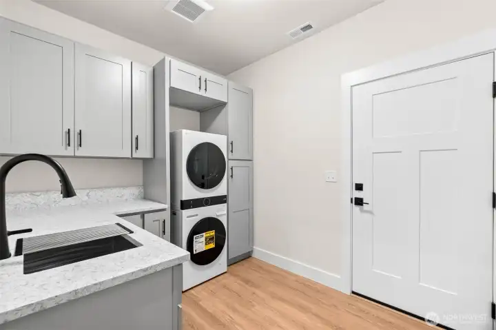 Smart laundry setup featuring an LG WashTower with ventless heat pump dryer and built-in intelligence for efficient performance.