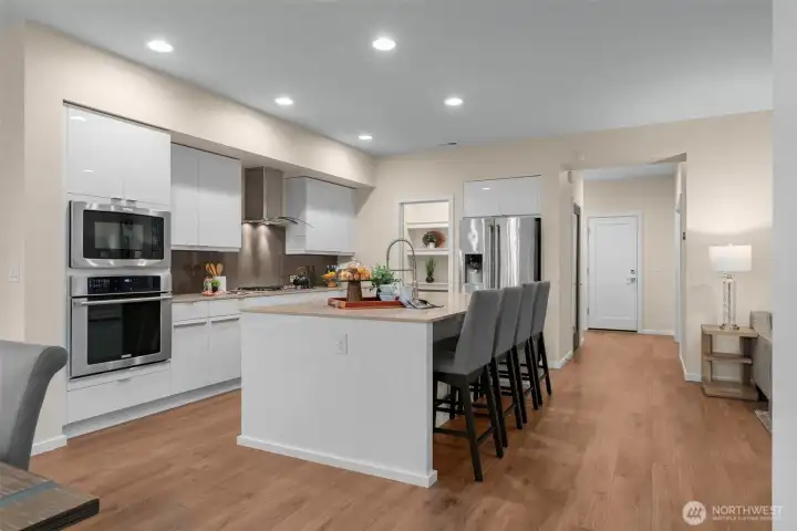 Oversized island provides all the space for food prep and entertaining.