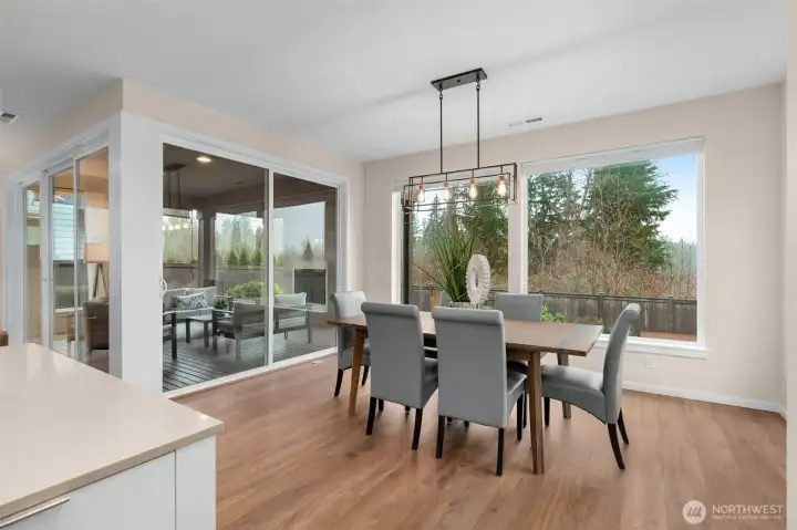 Dine in style with a view of a protected green space.