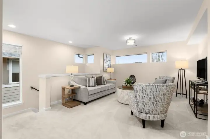 Upstairs you'll find a spacious flex space which can be used however you like!