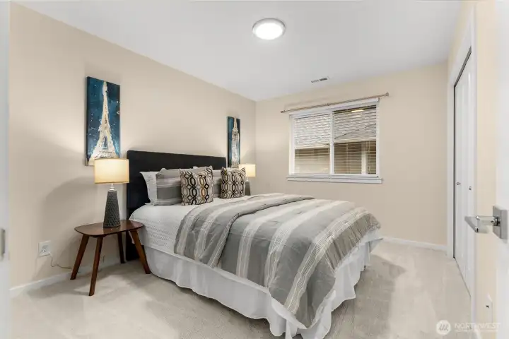 Third bedroom is cozy and spacious.